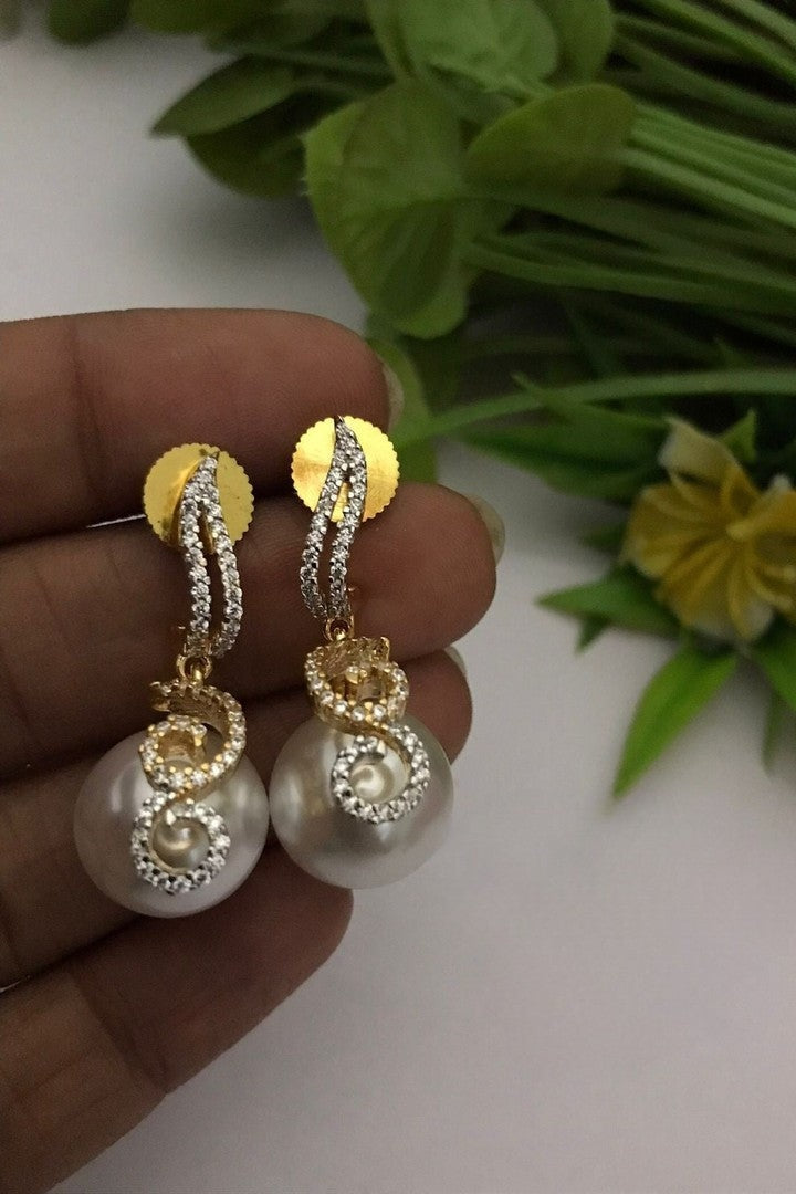 Komal ad earrings