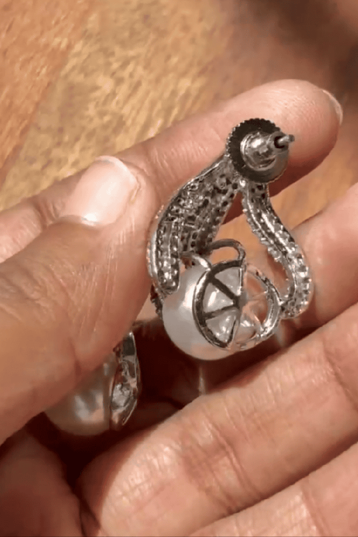 Floral diamond on pearl