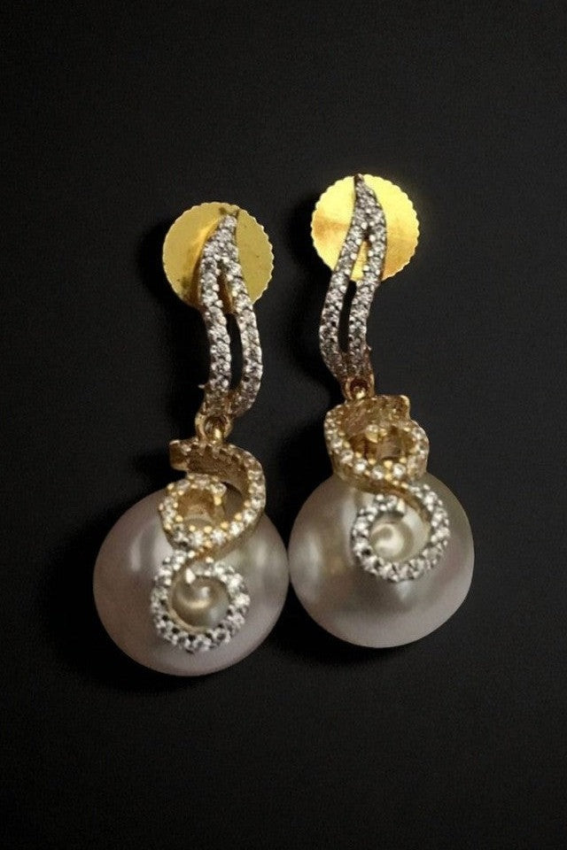 Komal ad earrings