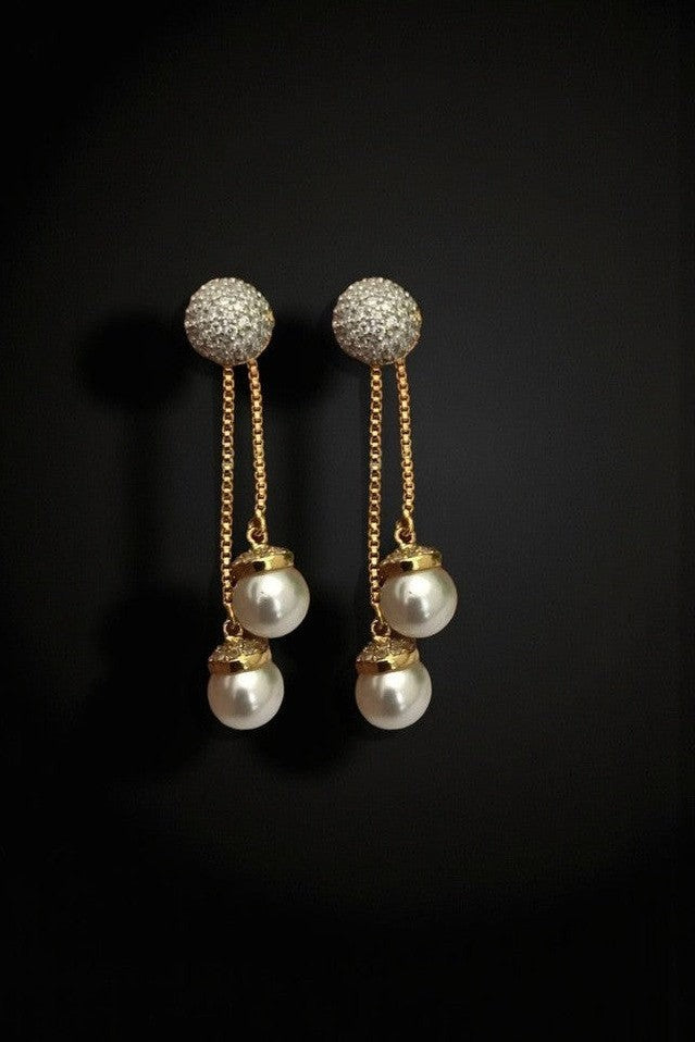 Pearl drop ad earrings