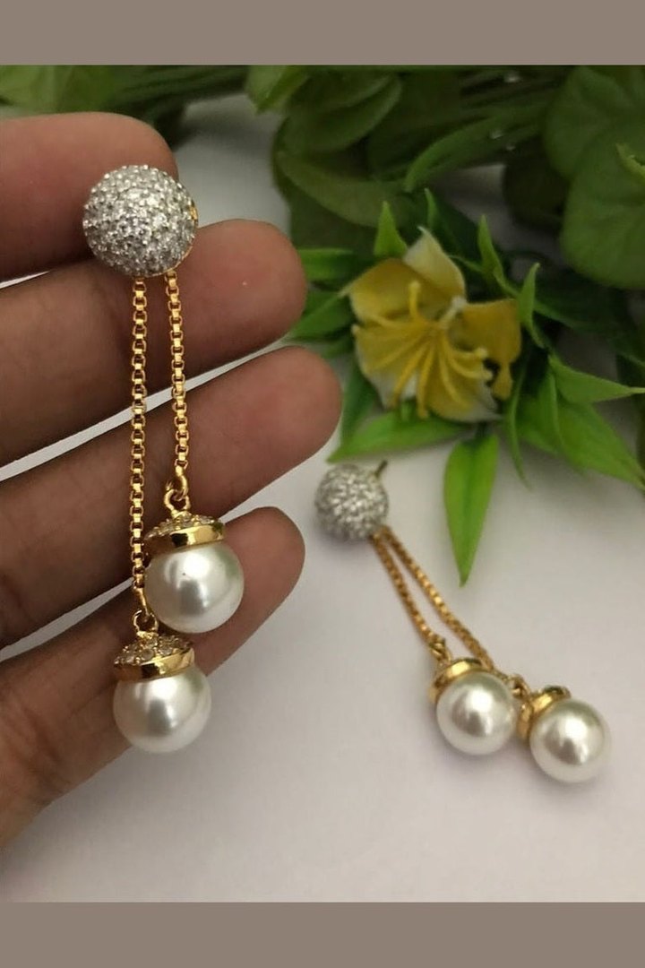 Pearl drop ad earrings