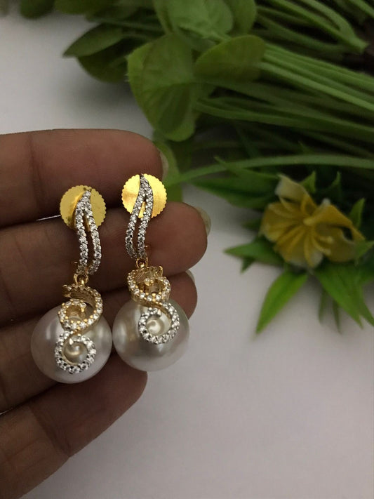 Komal ad earrings