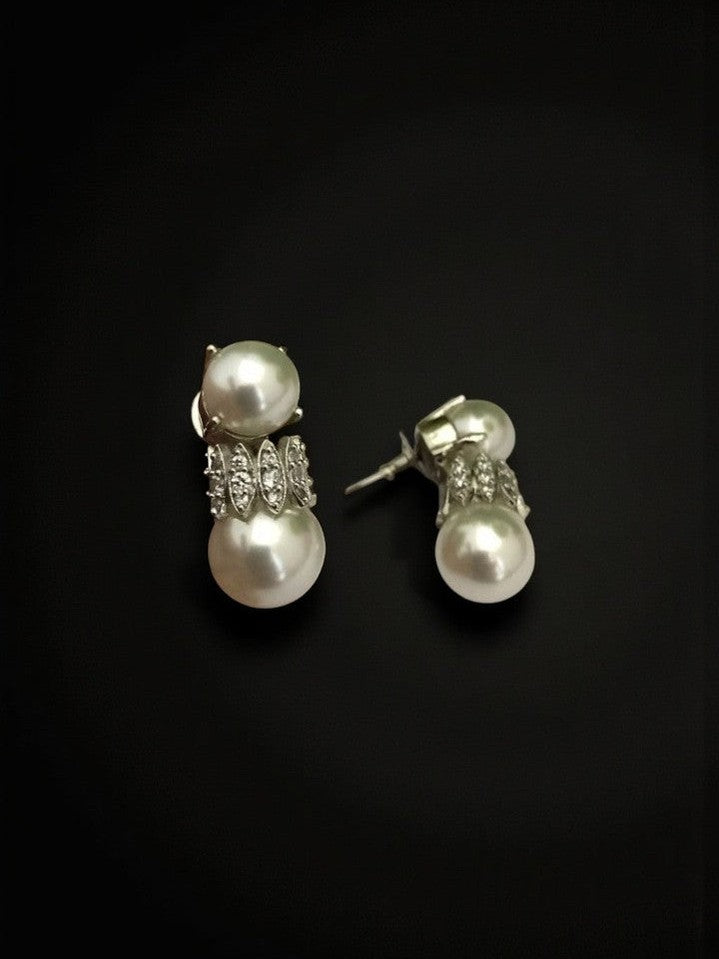 Kitashi ad earrings