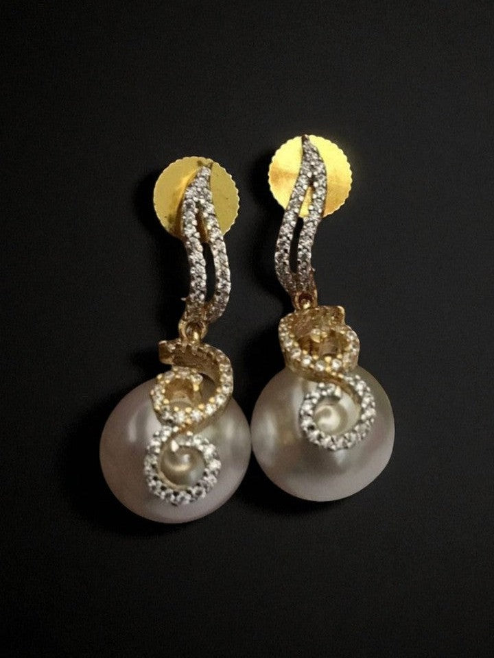 Komal ad earrings