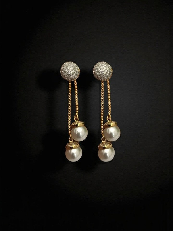Pearl drop ad earrings
