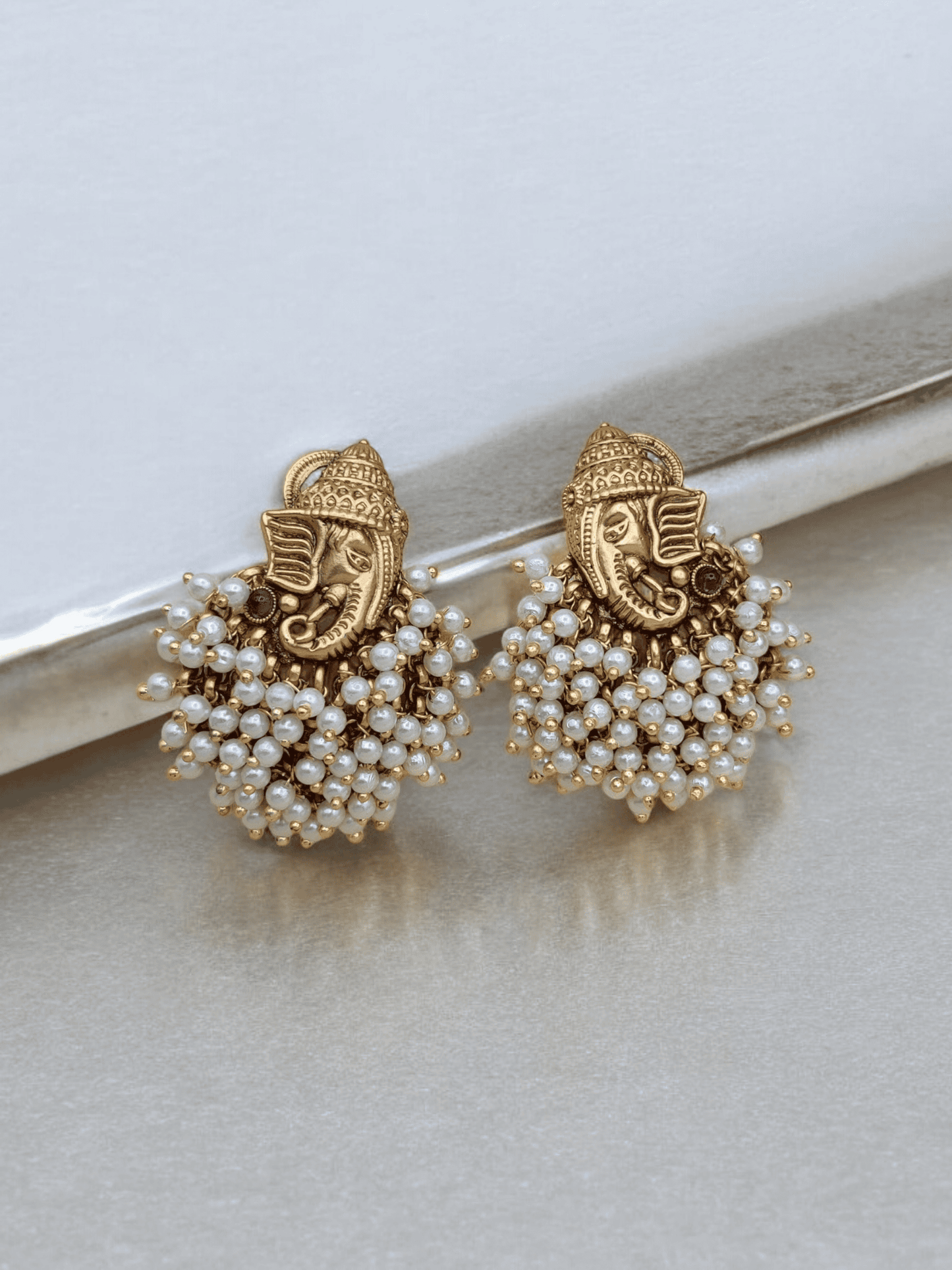 Karpur Earrings