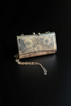Vibhiksha oxidised clutch