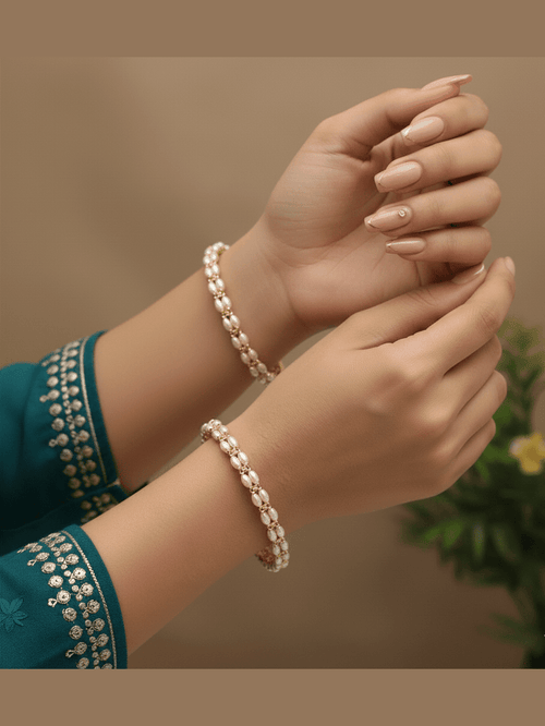 Aamani Real Pearl Bangles by Aganya Kreation — pair of 22k gold-plated pure brass bangles with genuine freshwater pearl embellishment, size 2.4 shown