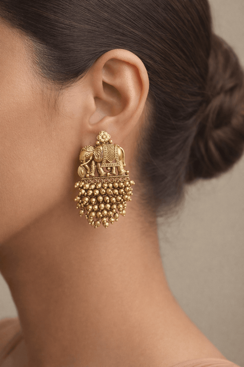 Maneka Elephant Jhumka Earrings in 18k gold plated pure brass with polki polish and pearl accents by Aganya Kreation, White and Golden