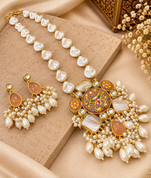 Aganya kreation Jewelry Rajshree Meenakari Faux and Baroque Pearl Gold Plated Necklace Set for Women | Aganya Kreation. Peach