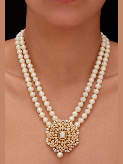 Charita Real Pearl Set with freshwater pearl necklace, earrings, and shell pearl mala in 22k gold plated brass by Aganya Kreation