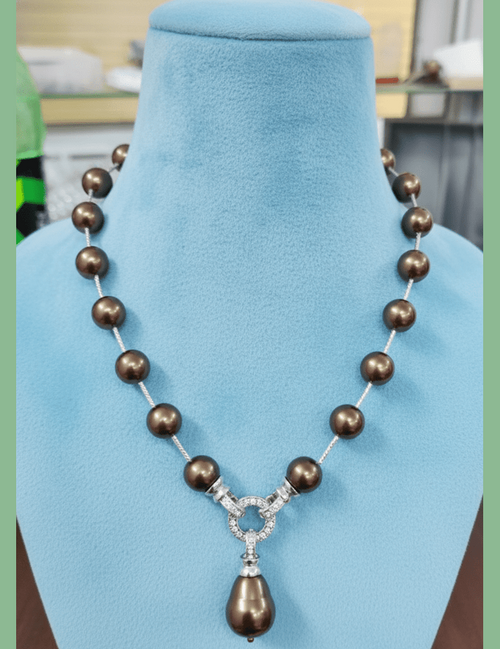 Aganya kreation Necklaces Omya shell  pearl mala copper colour