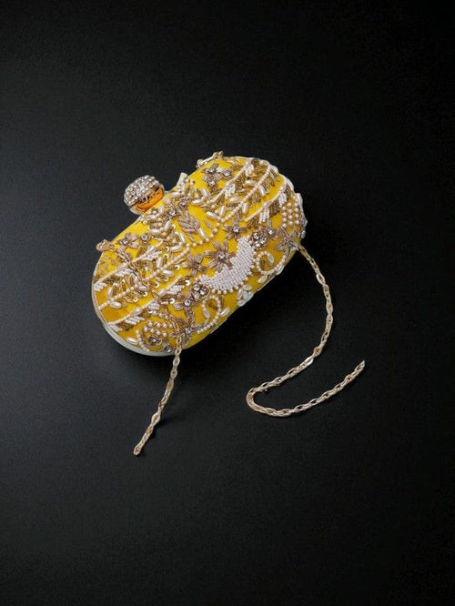 Aganya kreation Saanaya Clutch - Elegant Embroidered Oval Design