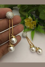 Pearl drop ad earrings
