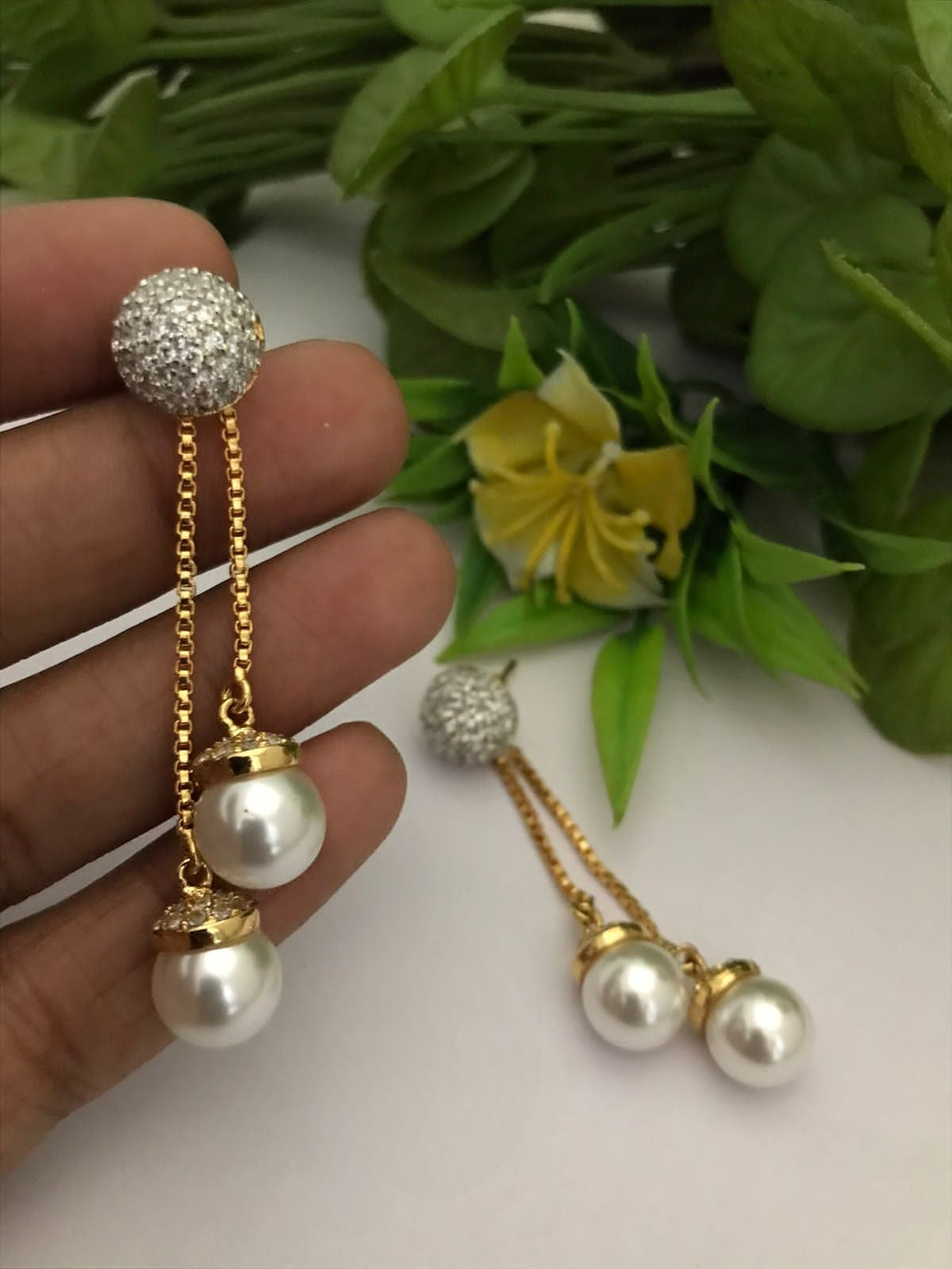 Pearl drop ad earrings