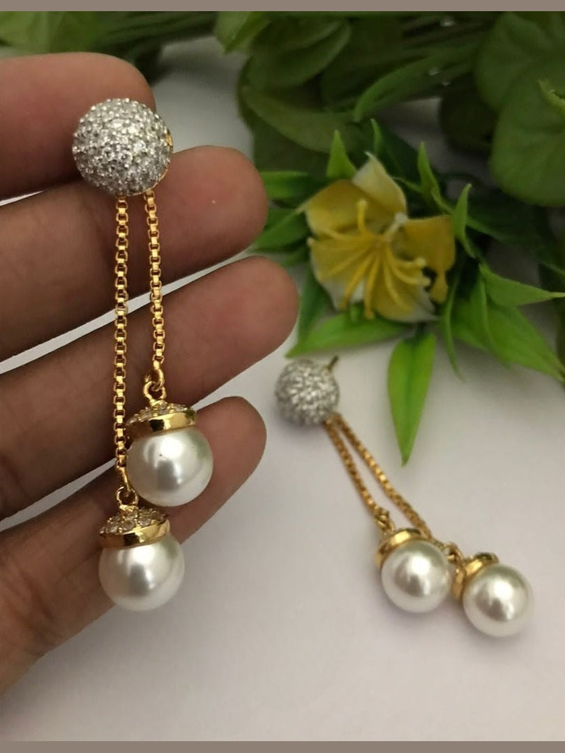 Pearl drop ad earrings