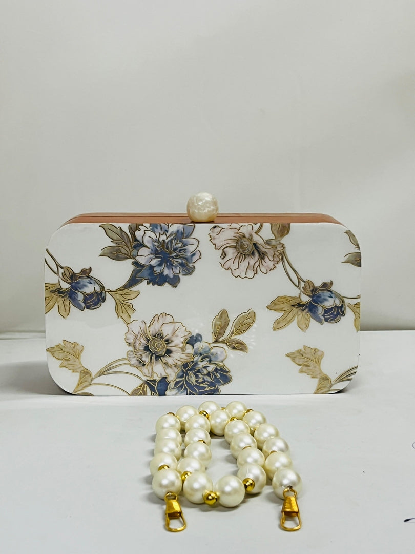 Sabia printed wooden clutch
