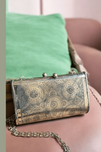 Vibhiksha oxidised clutch