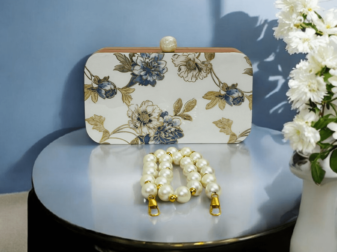Sabia printed wooden clutch